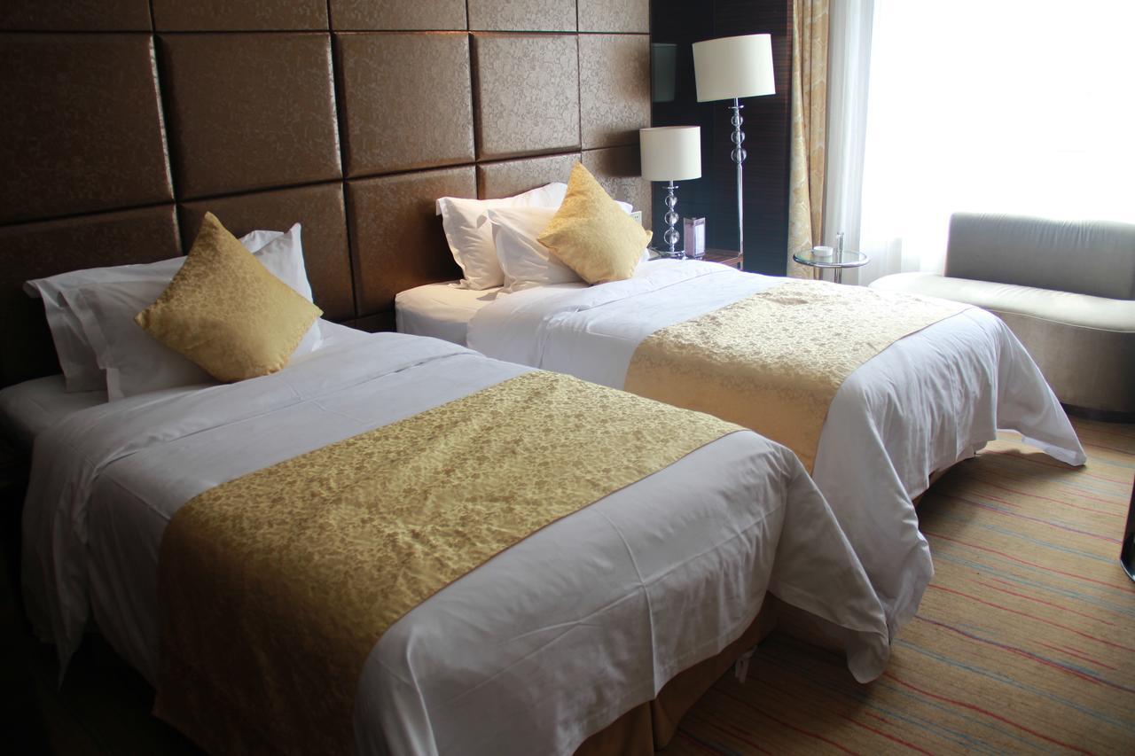 Huangjingang Holiday Hotel Jiexiu Room photo